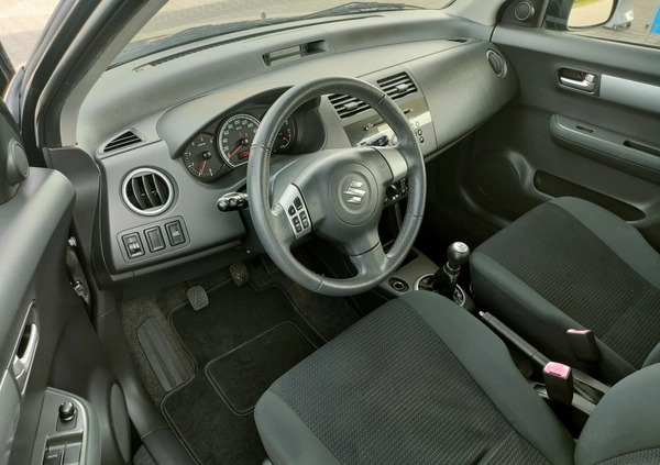 Suzuki Swift cena 13900 przebieg: 170675, rok produkcji 2009 z Zambrów małe 407